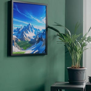 May include: A framed art print depicting a mountain range with snow-capped peaks under a bright blue sky with wispy clouds. The artwork is framed in a black frame and hangs on a dark green wall. A potted plant sits on a small table nearby.