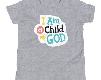 May include: A gray youth t-shirt with the text "I Am a Child of GOD" in a colorful, stylized font.