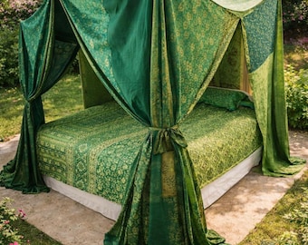 May include: A canopy bed with green and gold patterned fabric. The bed is outdoors, surrounded by greenery and a stone patio. The draped canopy and bedding feature a floral design.