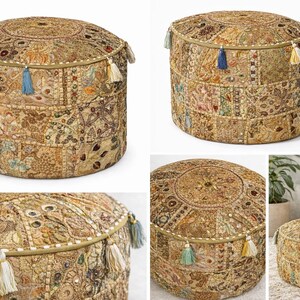 May include: Round, beige patchwork pouf with an embroidered top and colorful tassels. This decorative accent piece is suitable for living rooms, bedrooms, or entryways. The pouf is approximately 46 cm in diameter and 36 cm high.
