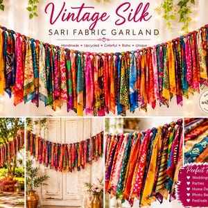 May include: A decorative garland made of numerous strips of multicolored vintage silk sari fabric tied to a central cord. The fabric features various patterns and vibrant hues including red, yellow, blue, and green, creating a textured display.