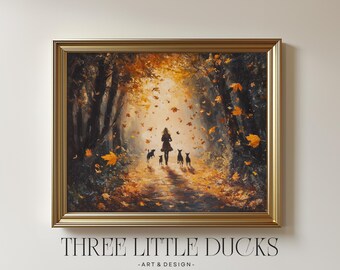 May include: A framed oil painting depicting a person walking through an autumn forest with four small dogs. The scene features golden light, falling orange leaves, and dark tree silhouettes. Below the frame, the text reads THREE LITTLE DUCKS -ART & DESIGN-.