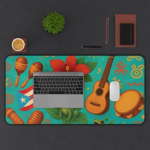 May include: A teal desk mat featuring a vibrant design with maracas, a Puerto Rican flag, a red flower, a guitar, and a tambourine. A laptop, mouse, and other office supplies are also present.