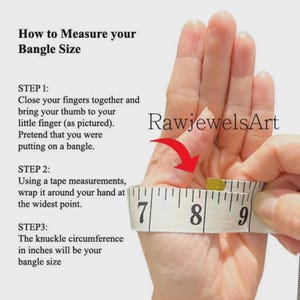 May include: An instructional graphic titled How to Measure your Bangle Size with three steps. It shows a hand with fingers closed and thumb tucked, wrapped in a white measuring tape showing inches, with a red arrow pointing to the hand.