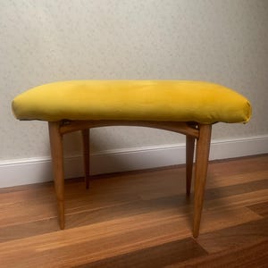 Velvet upholstered footstool