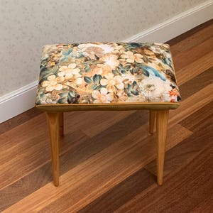 Velvet upholstered footstool
