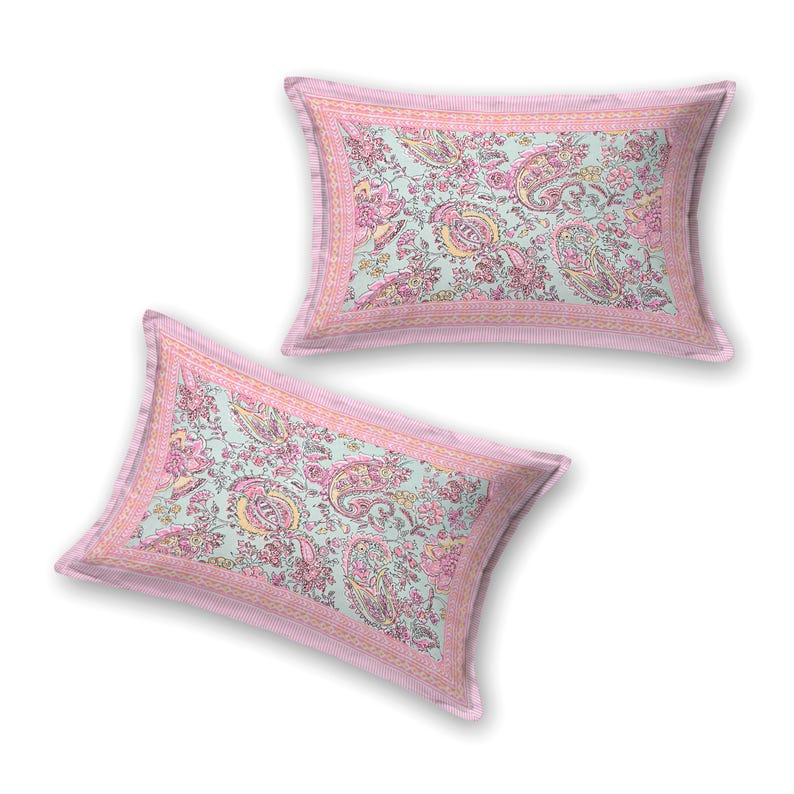 May include: Two rectangular pillowcases with a light blue background and a paisley floral pattern in pink and yellow. The pillowcases have a pink border with a striped design.
