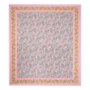May include: A large, rectangular textile with a repeating paisley pattern in pink, yellow, and green on a light blue background. The border is a light pink with a yellow floral design. This textile is suitable for a bedspread or tablecloth.