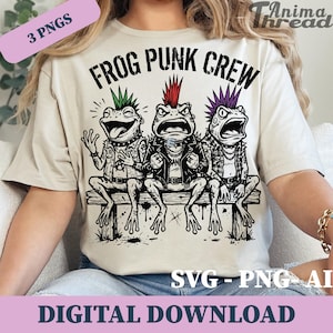 May include: Beige t-shirt featuring a graphic of three punk rock frogs with mohawk hairstyles, leather jackets, and studded accessories. The text "FROG PUNK CREW" is above the frogs. The image also includes the text "SVG - PNG - AI" and "DIGITAL DOWNLOAD".