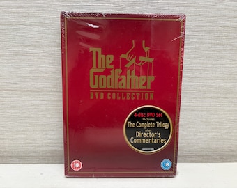 The Godfather DVD Collection includes The Complete Trilogy 4 Disc Set 18 ( UK Format) Region 2 NEW in Cellophane