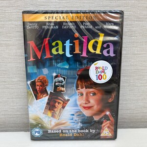 May include: A sealed DVD of the film "Matilda" with a colourful title and images of the cast. The cover features a young girl and the text "Based on the book by Roald Dahl". Includes a "Roald Dahl 100" sticker.