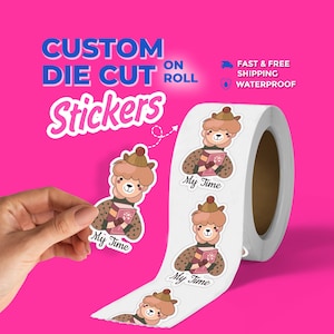 May include: A roll of custom die cut stickers featuring a cartoon llama wearing a brown hat and a patterned sweater while holding a pink book. The text My Time is printed below the llama. The background is bright pink with white text.
