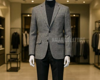 May include: A mannequin wearing a gray plaid blazer, black turtleneck, and black pants. The blazer has two front pockets and a two-button closure. The outfit is completed with black Chelsea boots. The text "AMAR CLOTHING" is visible on the blazer.