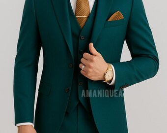 May include: A three-piece teal suit with a matching vest, jacket, and trousers. The suit features a white dress shirt, a brown tie, and a pocket square. A gold watch and ring are visible. The text "AMANIQUEA" is printed on the jacket.