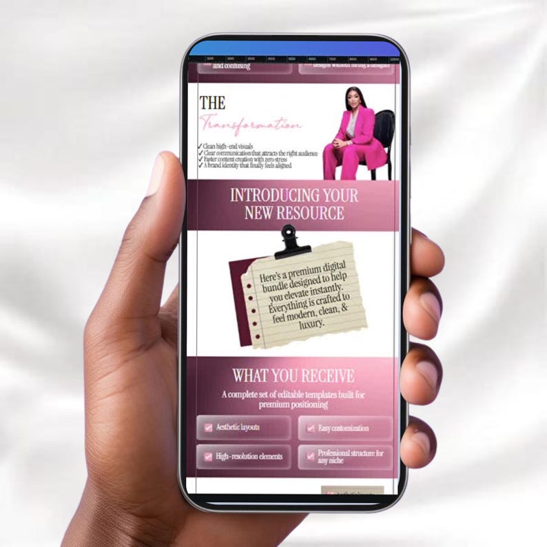 May include: A smartphone displays a website with a pink and white design. The site promotes a digital bundle with editable templates. The text includes "The Transformation" and "Introducing Your New Resource."
