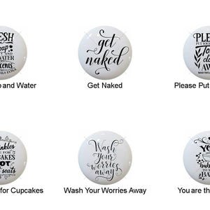 May include: A collection of six white ceramic cabinet knobs with black text. The knobs feature phrases like "Fresh Soap and Water," "Get Naked," and "You are the Bubbles." These decorative knobs are suitable for bathroom or kitchen decor.