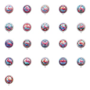 May include: Twenty-one round ceramic knobs with a pink flamingo design. Each knob features a different flamingo pose and floral background.