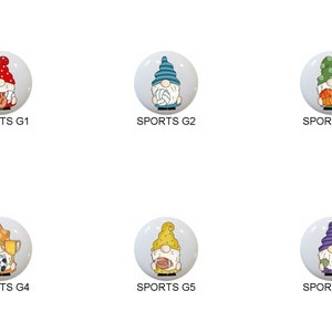 May include: Six round ceramic ornaments featuring gnomes dressed in different sports attire. Each gnome is holding a different sports item, including a baseball bat and glove, volleyball, basketball, soccer ball and trophy, football, and tennis racket. The ornaments are white with a white background and the text "SPORTS G1" through "SPORTS G6" is printed below each ornament.