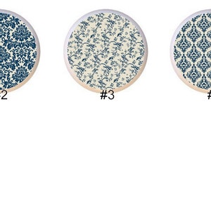 May include: Six different patterns of blue and white fabric designs. The patterns include floral, damask, and geometric designs.