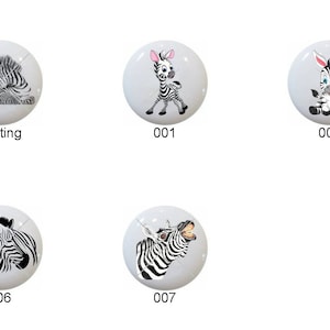May include: Ten different designs of ceramic round buttons featuring zebra illustrations. The designs include a zebra resting, a zebra with a pink bow, a zebra with a pink bow and a heart, a zebra with a pink bow and a heart, a zebra with a pink bow and a heart, a zebra with a pink bow and a heart, a zebra with a pink bow and a heart, a zebra with a pink bow and a heart, a zebra with a pink bow and a heart, and a zebra with a pink bow and a heart.