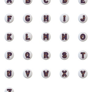 May include: A set of 26 alphabet letter buttons with a red, white, and blue American flag design. The letters are in a white circle with a blue outline.