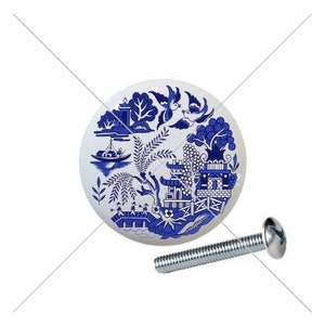 May include: Blue and white ceramic knob with a willow pattern design. The knob has a silver screw.