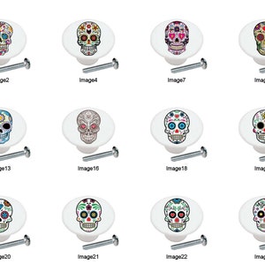 May include: Set of 10 white ceramic cabinet knobs with colorful sugar skull designs. Each knob features a different skull design with intricate details and vibrant colors.