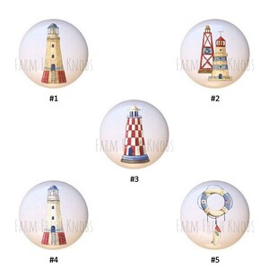 May include: Five ceramic knobs with nautical themes. The knobs feature lighthouses, a life preserver, and red, white, and blue colors. The knobs are labeled with numbers 1 through 5.