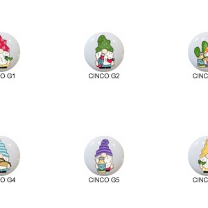 May include: Six different gnomes with various Cinco de Mayo themed accessories. Each gnome is wearing a different colored hat and holding a different item, such as a maraca, a bottle of hot sauce, a taco, and a cactus. The gnomes are all smiling and have white beards.