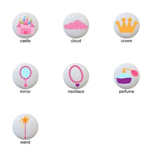 May include: A set of 12 ceramic knobs featuring princess-themed illustrations. The knobs are white with colorful designs, including a carriage, castle, cloud, crown, dress, frog, mirror, necklace, perfume bottle, shoes, tiara, and wand.