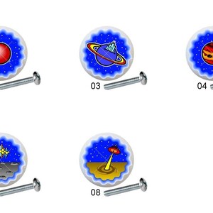 May include: Eight round, blue and white ceramic knobs with different space-themed designs. The knobs have a silver screw on the back.