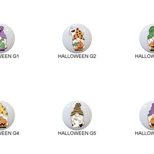 May include: Six round white ceramic ornaments with different Halloween themed gnome designs. Each gnome is holding a pumpkin and has a different hat and outfit. The ornaments are labeled "HALLOWEEN G1", "HALLOWEEN G2", "HALLOWEEN G3", "HALLOWEEN G4", "HALLOWEEN G5", and "HALLOWEEN G6".