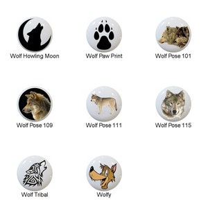 May include: A set of 13 ceramic tile designs featuring various wolf images, including howling wolves, wolf paw prints, and wolves in different poses. The tiles are white with black and brown accents.