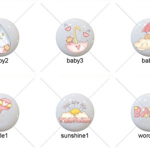 May include: Set of 10 baby-themed round buttons with various designs, including a baby girl, a rattle, a giraffe, a baby under an umbrella, a word art design that says "Baby", and a border of pink hearts. The buttons are all white with a light blue background.