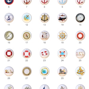 May include: Thirty-eight white ceramic knobs with nautical themed designs. The designs include anchors, ships, compasses, steering wheels, life preservers, and portholes.