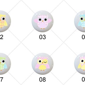 May include: Ten different designs of round, white, ceramic knobs with a cute owl design. Each knob features a different color and pattern, including pink, blue, yellow, and green.