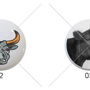 May include: Four white ceramic round buttons with black and white images of cow and bull heads. The buttons are numbered 01 through 04.
