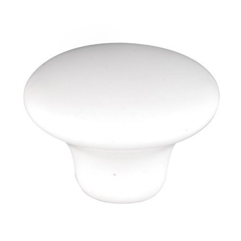 May include: White ceramic cabinet knob with a rounded top and a smooth, slightly textured surface.