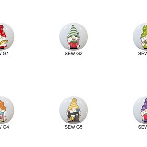 May include: Six different gnome ornaments with a sewing theme. Each gnome is wearing a different colored hat and holding a different sewing item. The gnomes are all standing on a white background.  The text "SEW G1", "SEW G2", "SEW G3", "SEW G4", "SEW G5", and "SEW G6" is printed below each gnome.