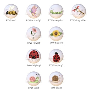 May include: Set of ten 1 inch round ceramic tiles with various nature-themed designs. The designs include a bee, butterfly, caterpillar, dragonflies, flower, ladybug, and snail.