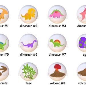 May include: Set of 10 ceramic knobs featuring dinosaurs, eggs, footprints, a tree, and two volcanoes. The knobs are white with colorful illustrations.
