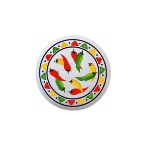 May include: A white ceramic plate with a colorful border design featuring red, yellow, and green chili peppers. The border is a repeating pattern of triangles and dots.