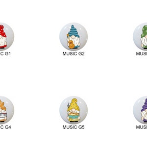 May include: Six round ceramic ornaments featuring gnomes playing musical instruments. The gnomes are wearing different colored hats and holding a microphone, ukulele, electric guitar, keyboard, drums, and maracas.