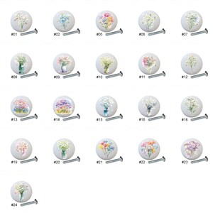 May include: Twenty-four different floral designs on white ceramic knobs with silver screws. Each knob features a different watercolor floral bouquet.