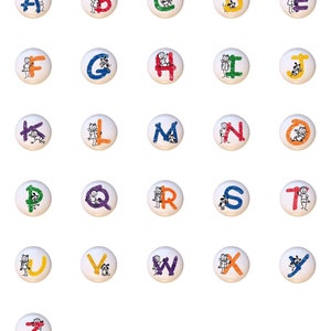 May include: A set of 26 alphabet letter tiles, each featuring a different letter of the alphabet and a colorful illustration. The tiles are white with black outlines and are arranged in alphabetical order.