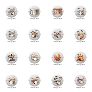 May include: A collection of sixteen white cabinet knobs, each featuring a different drum set design. The designs vary in color and style, with some including flames or floral elements. Each knob is labeled with a design number.