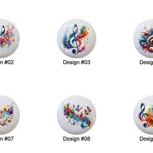 May include: A collection of ten white ceramic cabinet knobs, each featuring a colorful musical note design. The designs include a treble clef with floral and abstract elements in various colors. Each knob is labeled with a design number.