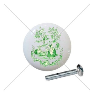 May include: White ceramic cabinet knob with a green pastoral scene. The knob features a detailed illustration of figures in a garden setting, with trees and decorative flourishes. Includes a silver screw for installation.