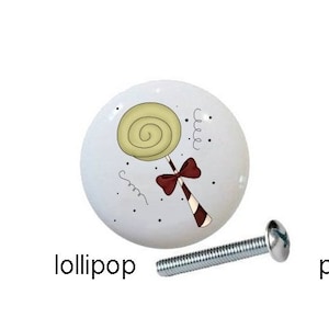 May include: Five white ceramic Christmas themed cabinet knobs with silver screws. The knobs feature a candy cane, a mug of hot chocolate, a lollipop, peppermints, and the words "Merry Christmas".
