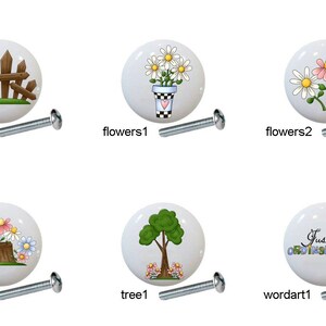 May include: Set of 10 ceramic drawer knobs with various garden-themed designs, including a birdhouse, fence, flowers, mailbox, tree stump, tree, and a word art design that says "Just an ordinary day".